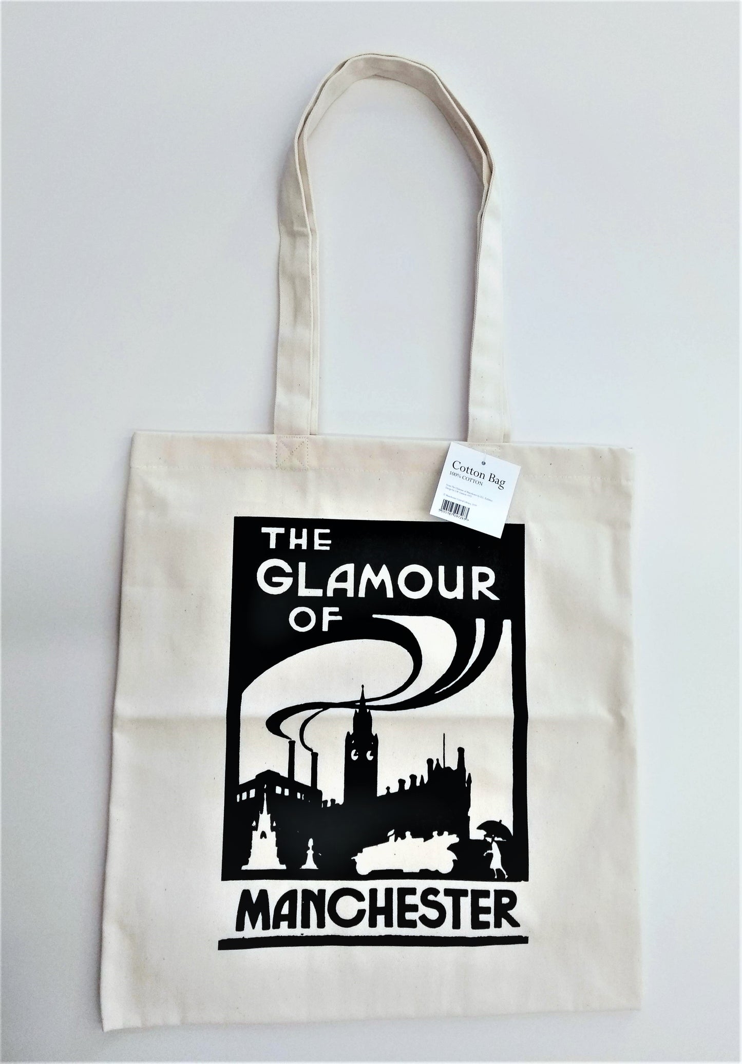 Cotton tote bag featuring - The Glamour of Manchester image. It was taken from the book by the Irish poet D.L Kelleher, design by J.M Gannon (1920)