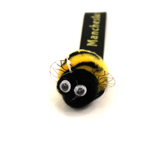 Fuzzy stick on bee with Manchester label