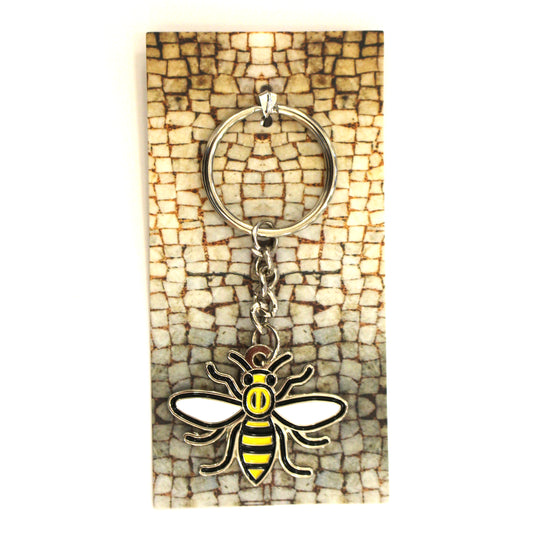 Enamel worker bee keyring featuring image of the mosaic bee floor from Manchester Town Hall